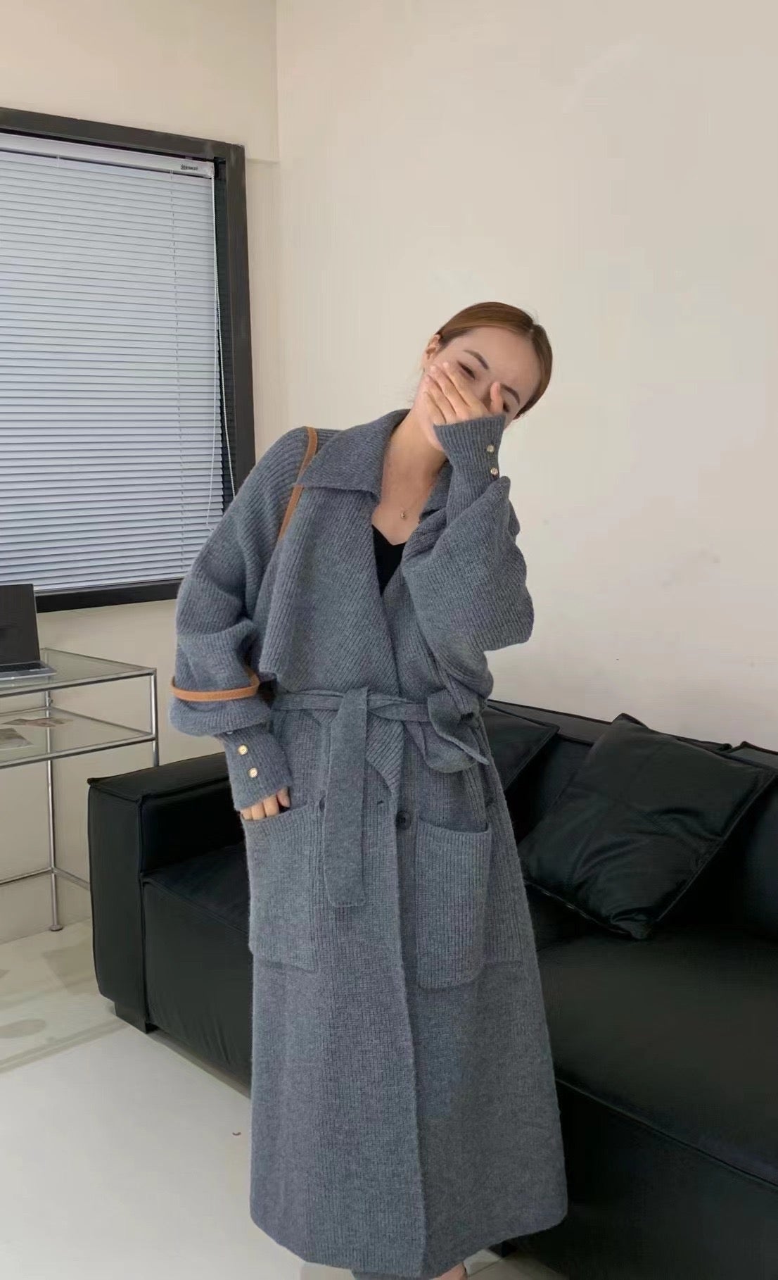 Knitted trench coat