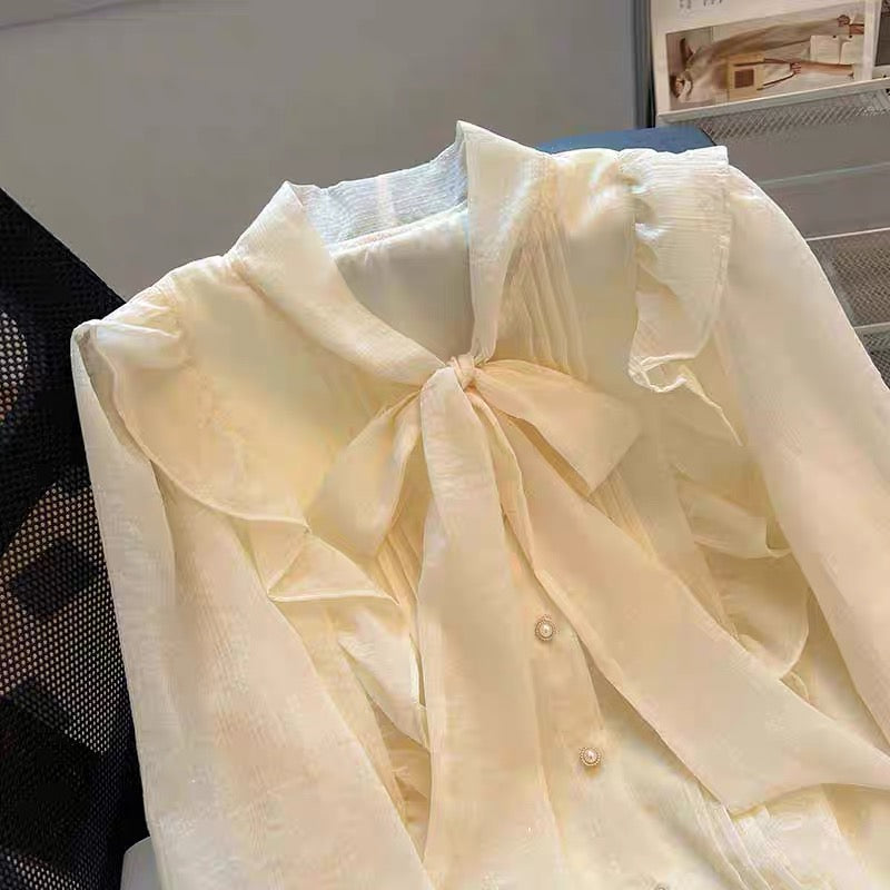 Side ruffle tie neck blouse