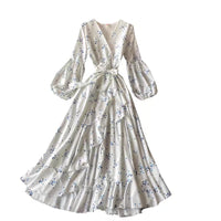 Asymmetrical ruffle wrap polka dot dress