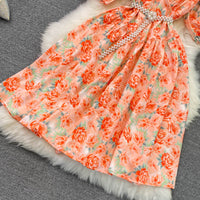 Pearl belted flappy heart neck floral dress
