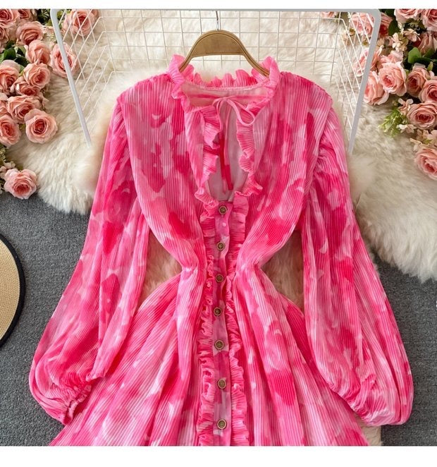 Peasant sleeve button through tie neck pleated dress