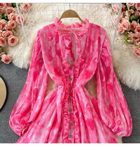 Peasant sleeve button through tie neck pleated dress
