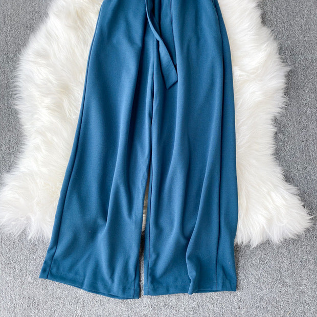Off shoulder waist tie ruffle jumpsuit
