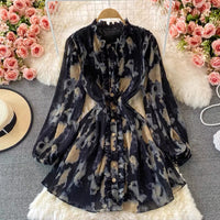 Peasant sleeve button through tie neck pleated dress