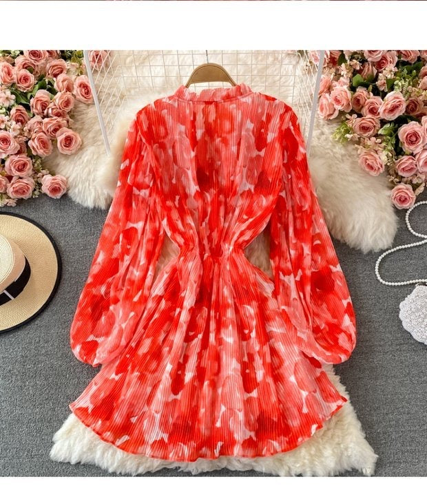Peasant sleeve button through tie neck pleated dress