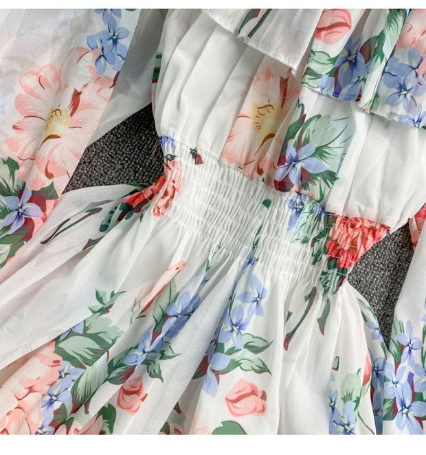 Off shoulder poet sleeve floral romper