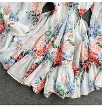 Off shoulder poet sleeve floral romper