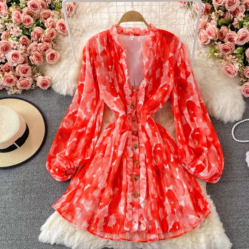Peasant sleeve button through tie neck pleated dress