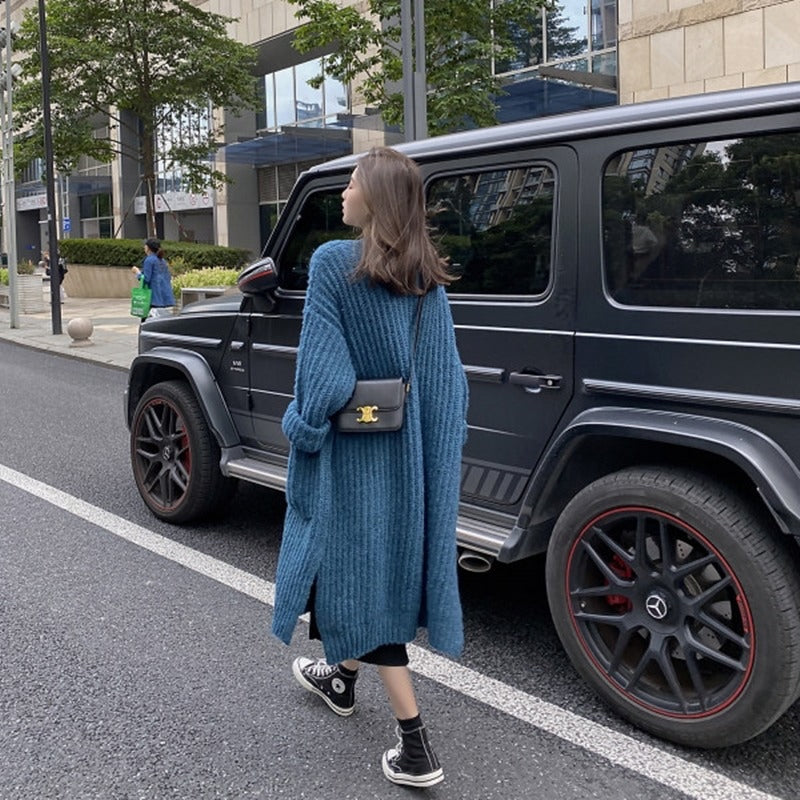 Knitted cardigan with buckets in Blue