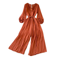 Long lantern sleeve wrap pleated jumpsuit with matching color belt