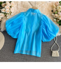 Melon sleeve cutout wing collar top