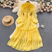 Peasant sleeve tie neck yellow solid maxi dress