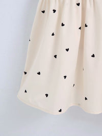 Heart prints smocked-bodice low drop dress