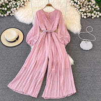 Long lantern sleeve wrap pleated jumpsuit with matching color belt