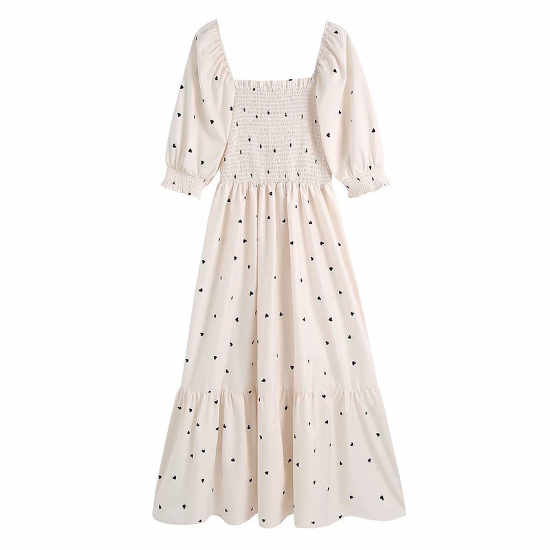 Heart prints smocked-bodice low drop dress