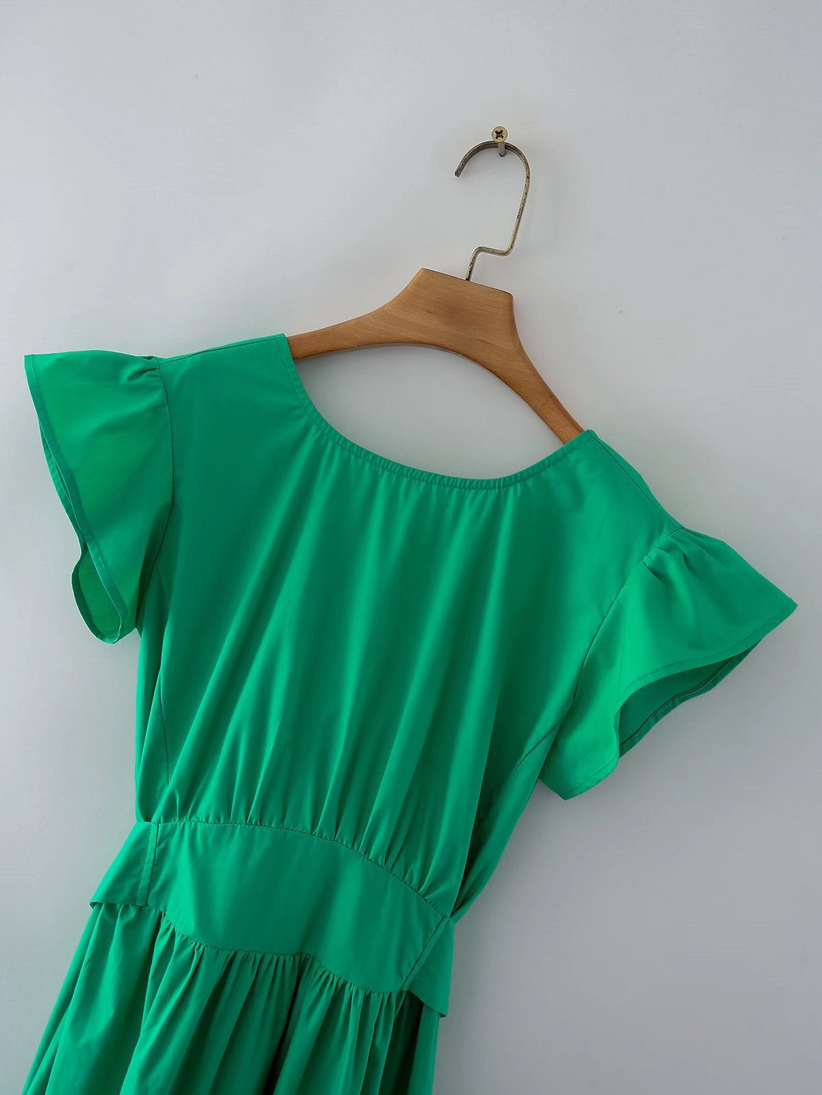 Deep V back cut green dress