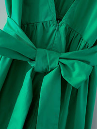 Deep V back cut green dress