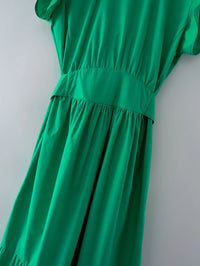 Deep V back cut green dress