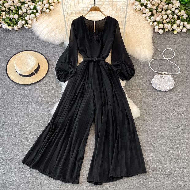 Long lantern sleeve wrap pleated jumpsuit with matching color belt