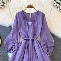 Long lantern sleeve wrap pleated jumpsuit with matching color belt