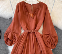 Long lantern sleeve wrap pleated jumpsuit with matching color belt