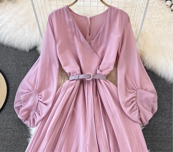 Long lantern sleeve wrap pleated jumpsuit with matching color belt