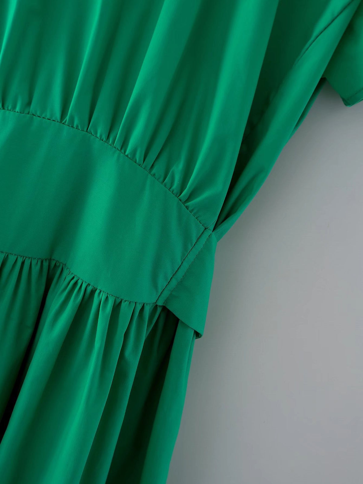 Deep V back cut green dress