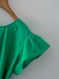 Deep V back cut green dress