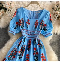 Red floret on blue midi dress