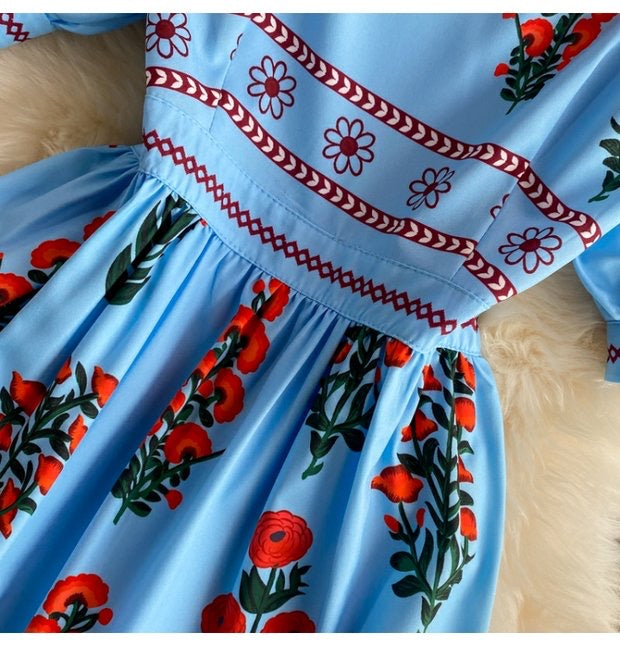 Red floret on blue midi dress